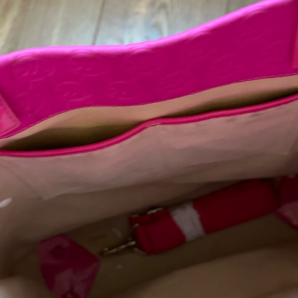 Michael Kors bright pink, has handles and also strap that comes off. - Picture 5 of 8